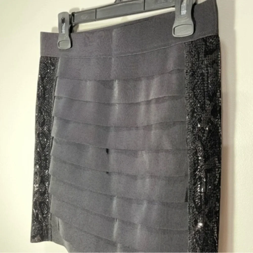 Tory Burch black mini bandage skirt with glitter side panels Size M